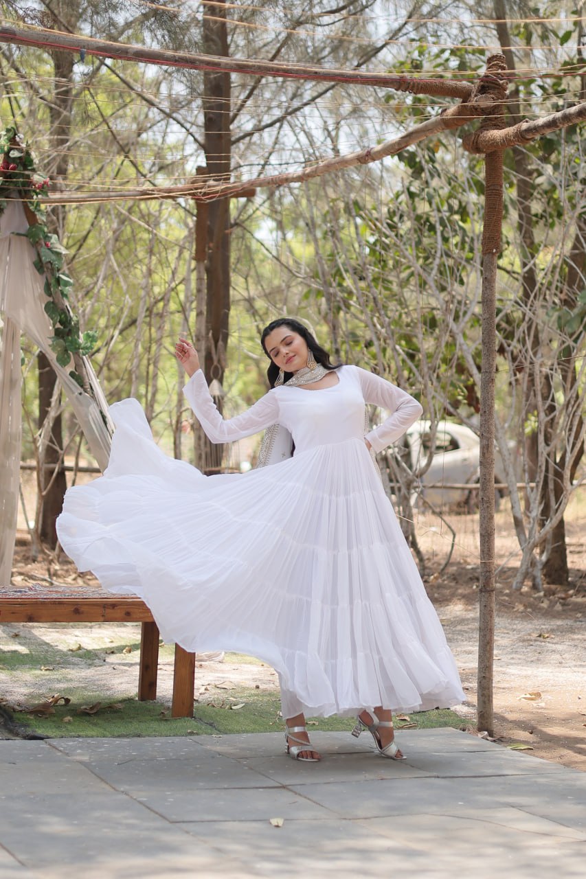 White Faux Georgette Faux Blooming With Rich Sequins Embroidered Work Gown