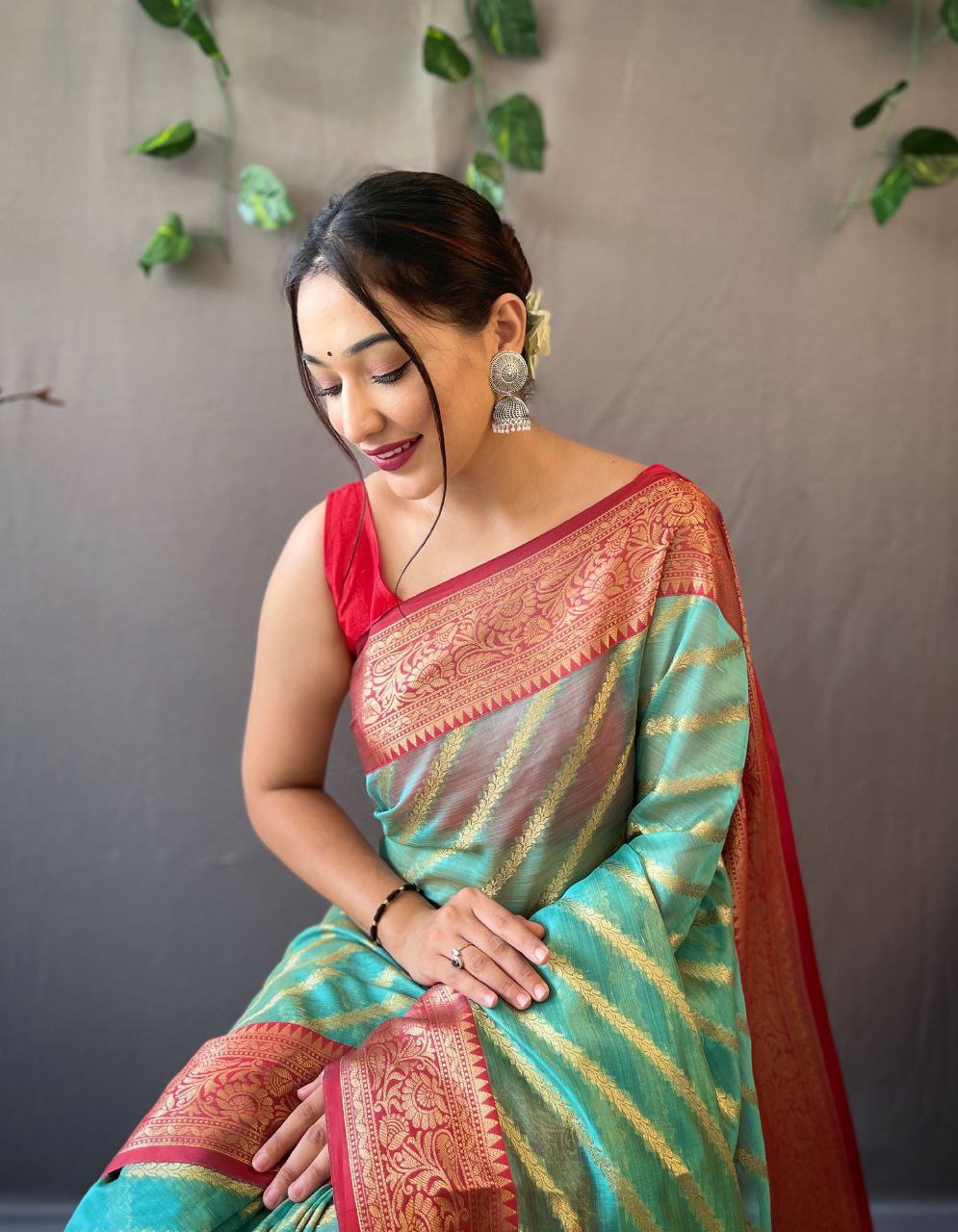 Teal Blue Organza Weaved Saree With Jacquard Border