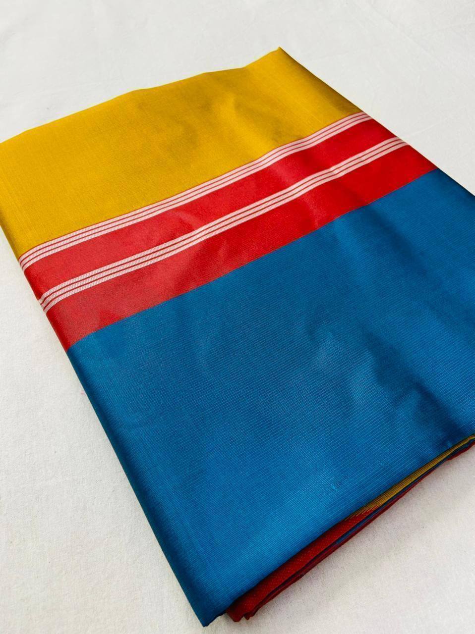 Kanchipuram Soft Lichi Silk Classic Contrast With A Blue Pallu With Diagonal Line Of Red And Silver Zari Work Saree