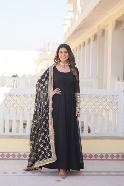 Black Faux Blooming Gown With Dupatta With Attractive Embroidered Sequins Work With Lace Border