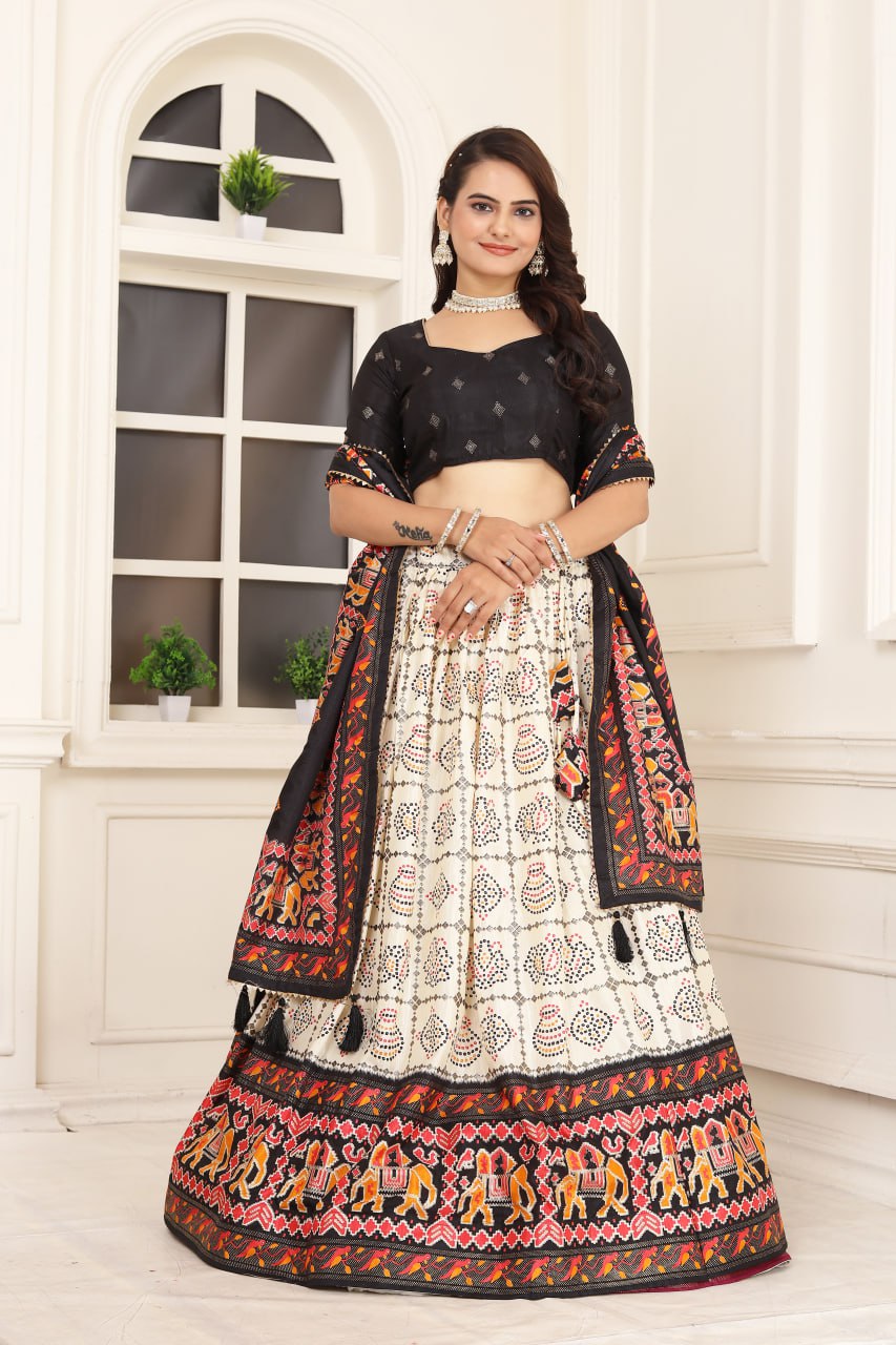 Black color Tussar Silk Bandhni and Foil Print Drawstring With Heavy Tassels And Zip Lehenga Choli