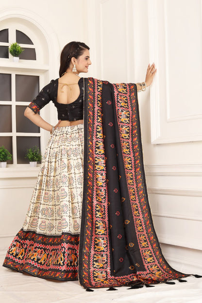 Black color Tussar Silk Bandhni and Foil Print Drawstring With Heavy Tassels And Zip Lehenga Choli