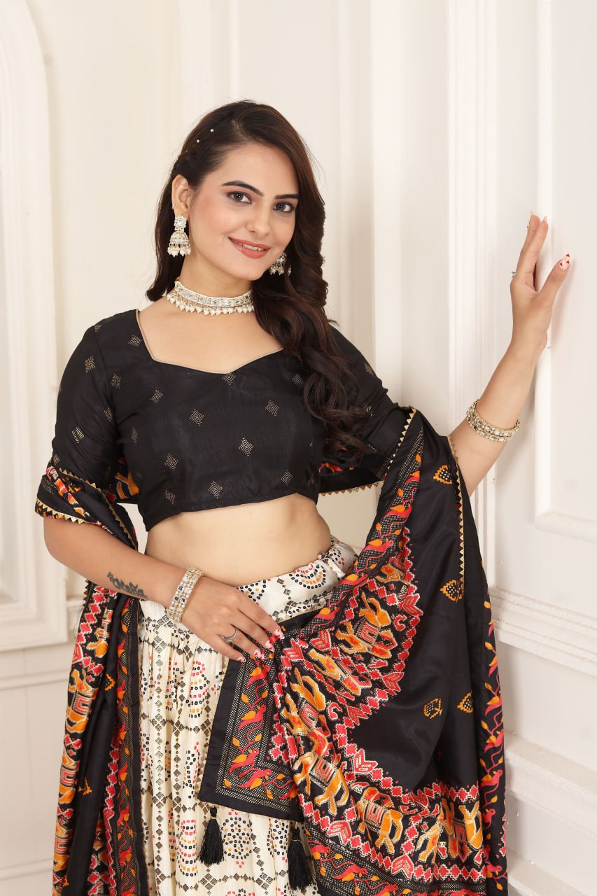 Black color Tussar Silk Bandhni and Foil Print Drawstring With Heavy Tassels And Zip Lehenga Choli