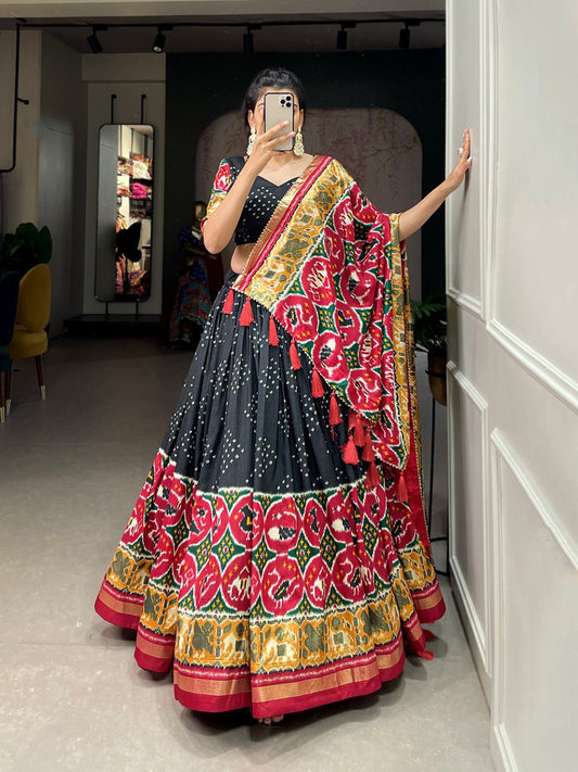 Black Color Tussar Silk Patola Print With Foil Work Lehenga Choli