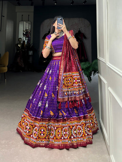 Purple Color Tussar Silk Patola Print With Gamthi Work Lace And Foil Work Navratri Lehenga Choli