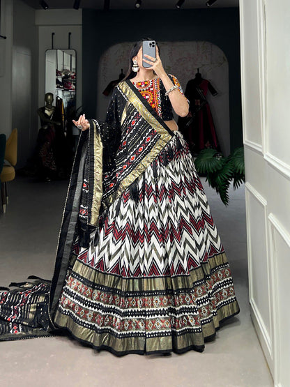 Black Color Tussar Silk Leheriya With Foil Print And Paper Mirror Work Navratri Lehenga Choli