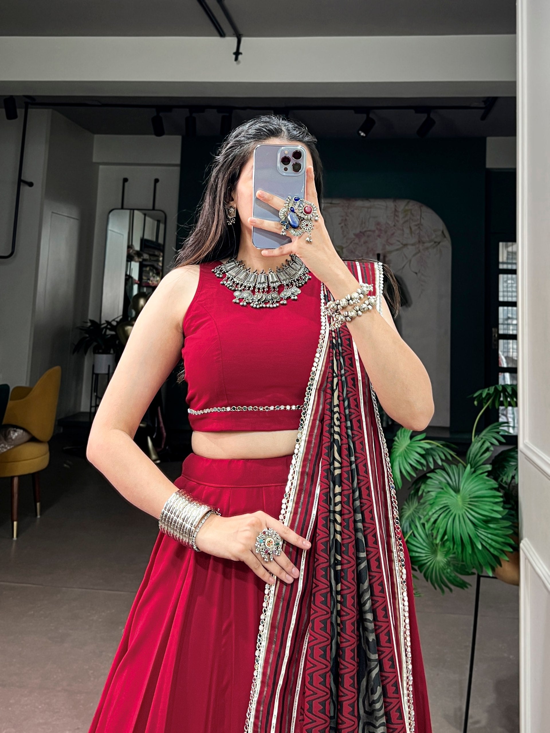 Maroon Red Fendi Silk Flared Lehenga Choli Set with Sleeveless Blouse & Printed Ajrakh-Inspired Dupatta with Mirror Lace