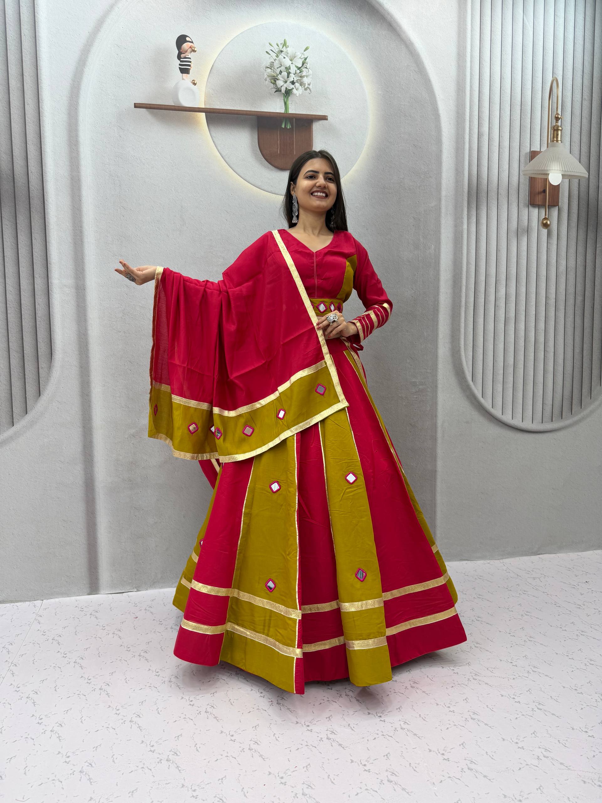 Hot Pink & Mehendi Olive Green Color-Blocked Roman Silk Navratri Special Flared Lehenga Choli Set with Real Mirror Work, Gold Gota Patti Borders, Full-Sleeve Blouse & Matching Dupatta