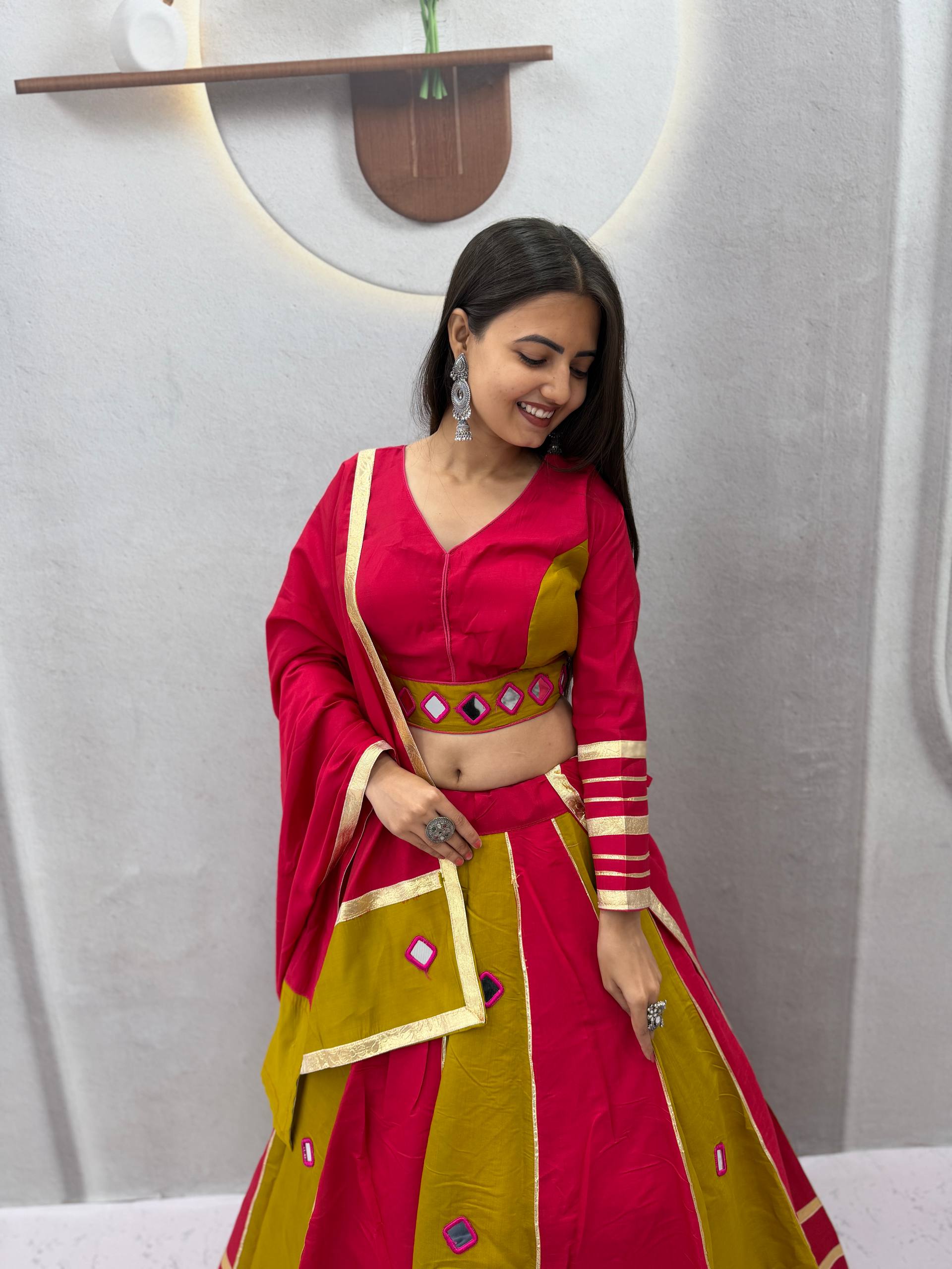 Hot Pink & Mehendi Olive Green Color-Blocked Roman Silk Navratri Special Flared Lehenga Choli Set with Real Mirror Work, Gold Gota Patti Borders, Full-Sleeve Blouse & Matching Dupatta
