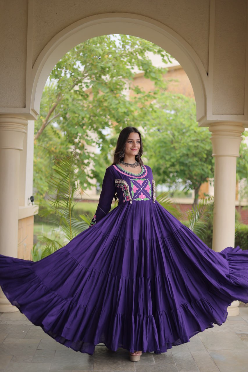 Deep Purple Kora Cotton Navratri Special High-Flare Tiered Gown with Multi-Thread Floral Embroidery, Real Mirror Work & Authentic Cowrie Shell (Codi) Embellishments