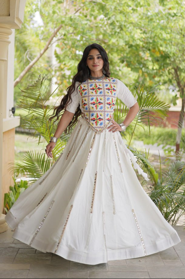 Off-White Rayon Navratri Lehenga Choli With Multi Mirror Lace Work, Attached Chain Detail & Tassels