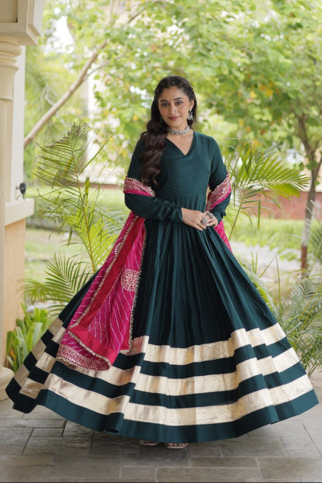 Bottle Green Rayon Navratri Gown With Gota Patti Lace & Pink Leheriya Printed Georgette Dupatta With Zari Embroidery Work