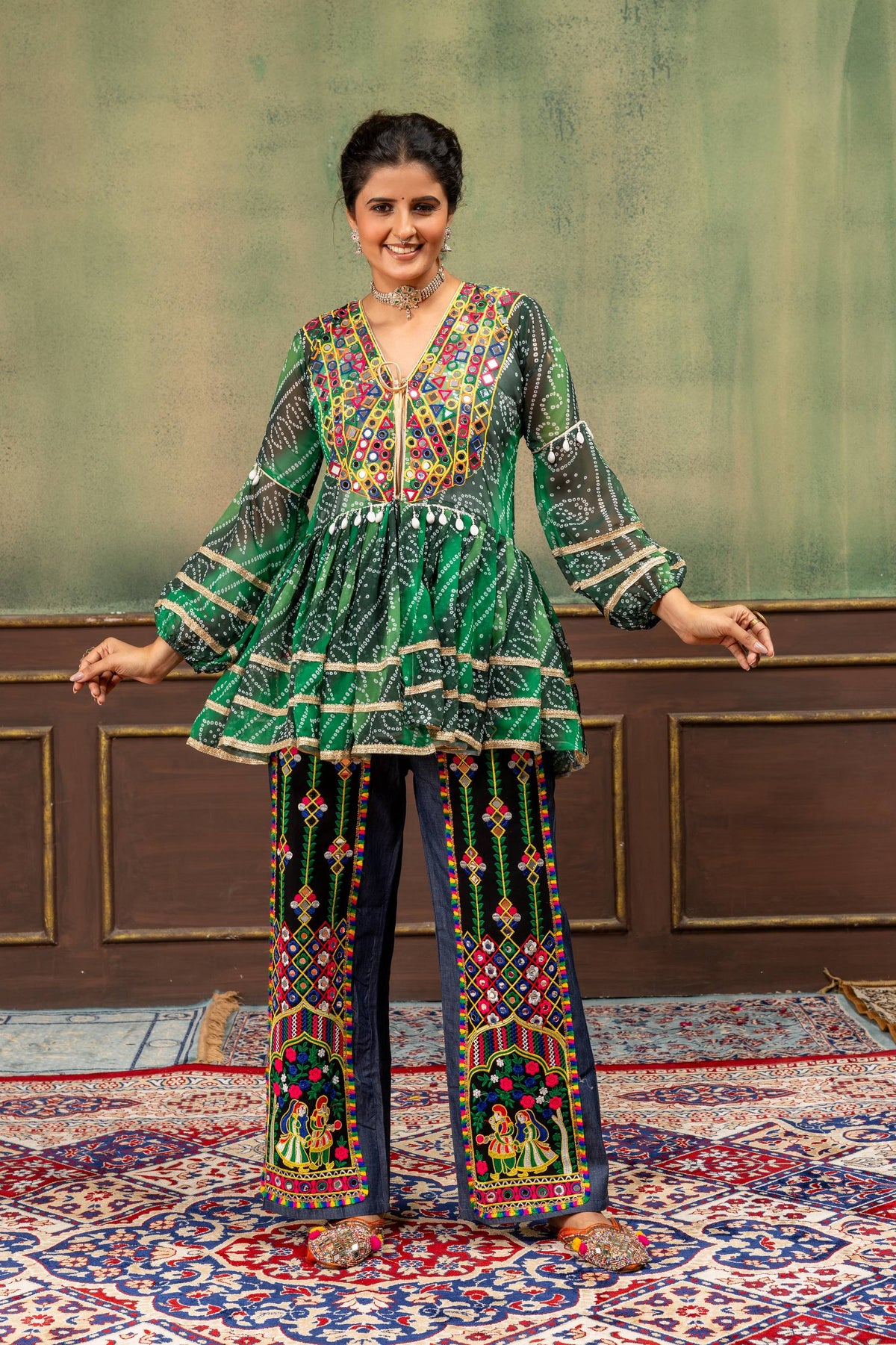Green Faux Georgette Bandhani Print Ruffle Peplum Top With Real Mirror Work & Embroidered Denim Jeans Navratri Set