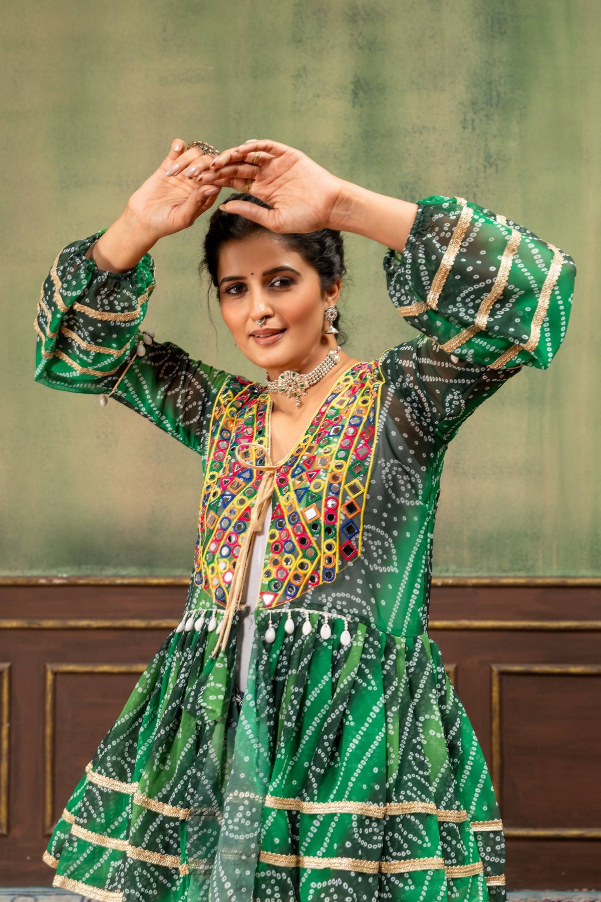 Green Faux Georgette Bandhani Print Ruffle Peplum Top With Real Mirror Work & Embroidered Denim Jeans Navratri Set