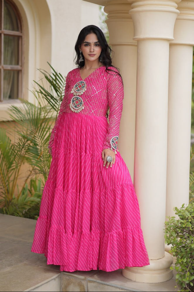 Rani Pink Laheriya Print Faux Georgette Tiered Anarkali Gown With Kutchi Patchwork & Shell Tassels Navratri Special Gown