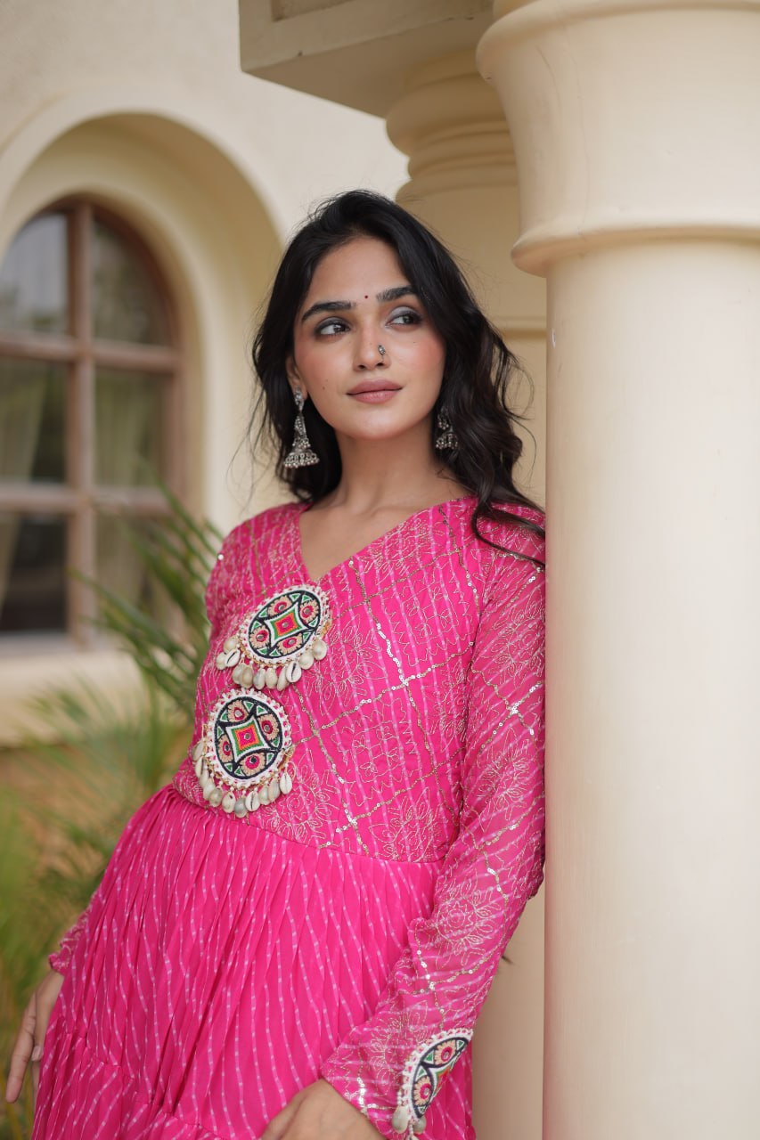 Rani Pink Laheriya Print Faux Georgette Tiered Anarkali Gown With Kutchi Patchwork & Shell Tassels Navratri Special Gown