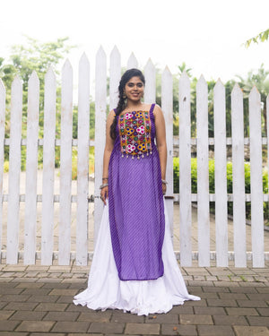 White pure rayon cotton plain frill pattern Navratri lehenga with micro cotton inner, Purple Kutchi mirror embroidered strap top, cowrie shell accents, and leheriya print front overlay