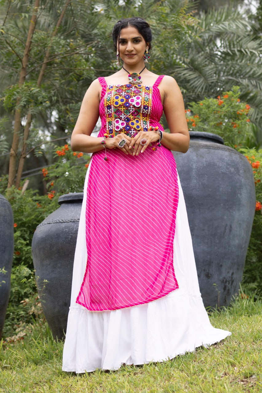 White pure rayon cotton plain frill pattern Navratri lehenga with micro cotton inner, Rani Pink Kutchi mirror embroidered strap top, and leheriya print front overlay