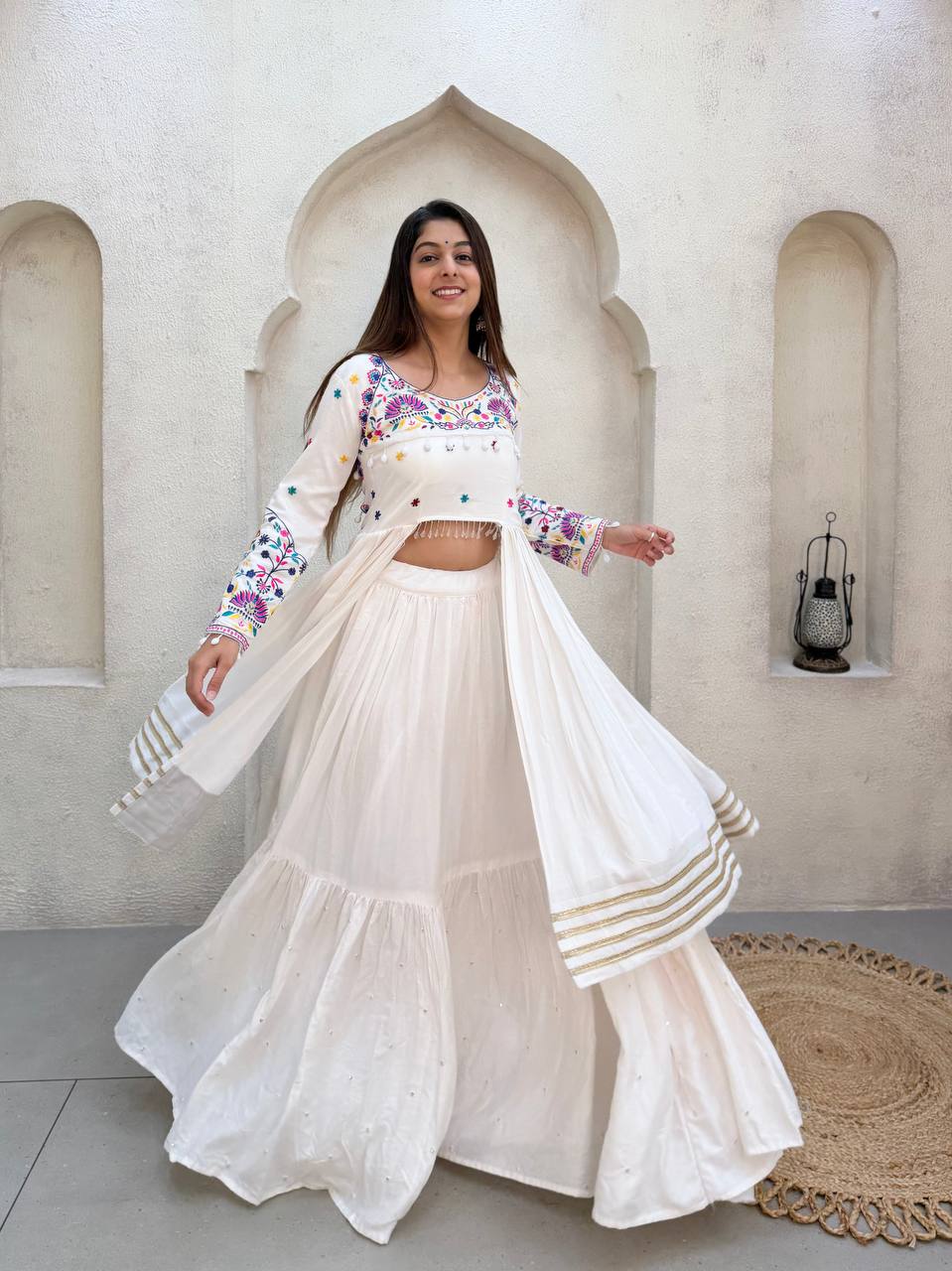 Off-White Rayon Thread Embroidery & Gota Patti Work Tiered Navratri Lehenga Choli Set With Long Front-Slit Top