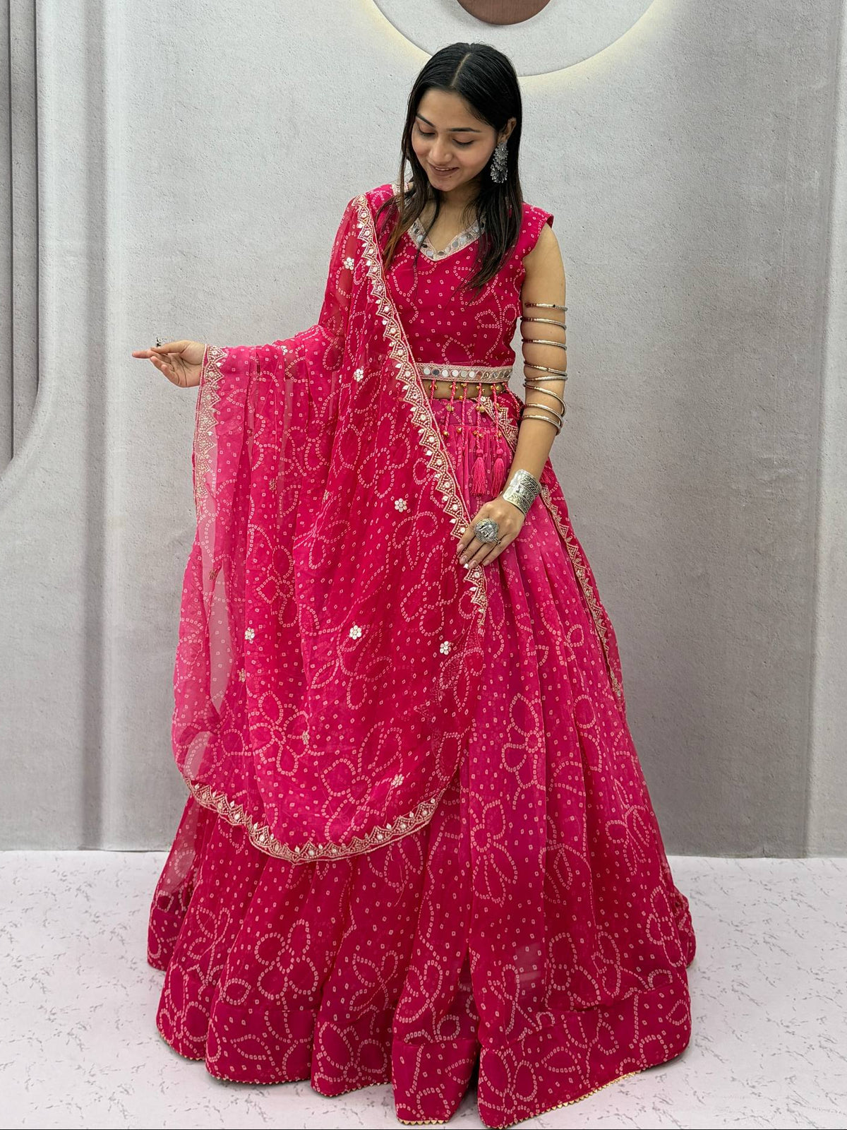 Rani Pink Fox Georgette Bandhani Print Heavy Embroidery & Mirror Lace Work Navratri Special Lehenga Choli Set With Dupatta