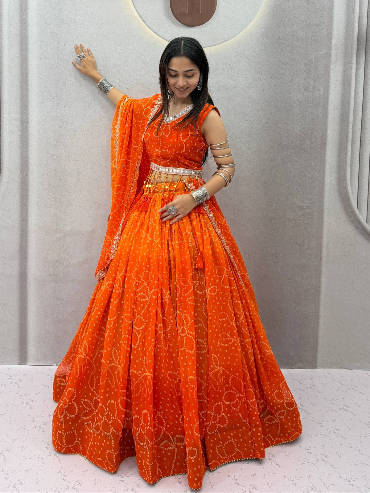 Orange Fox Georgette Bandhani Print Heavy Embroidery & Mirror Lace Work Navratri Special Lehenga Choli Set With Dupatta