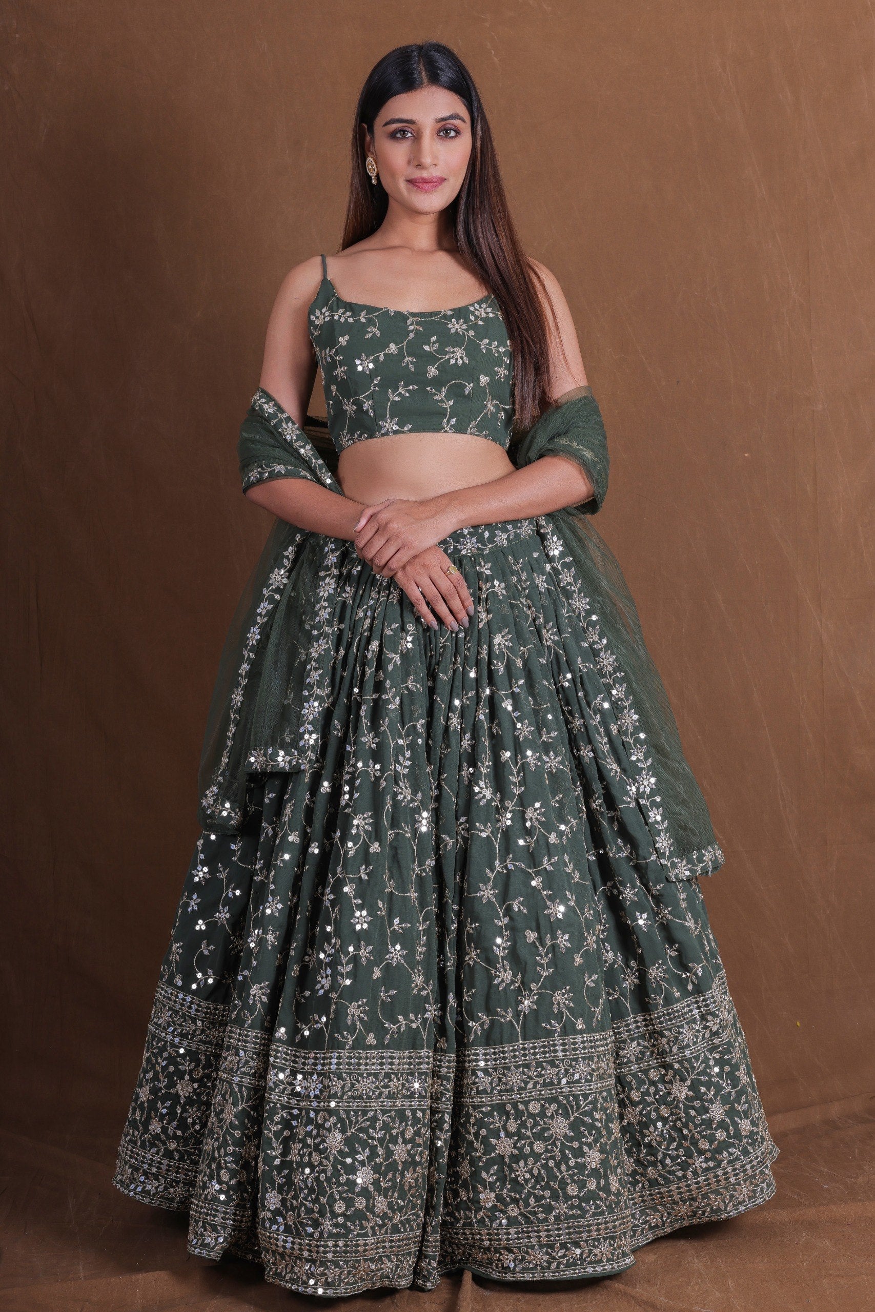 Dark Forest Green Georgette Flared Lehenga Choli Set with Rich Zari, Sequins & Floral Vine Embroidery, Sleeveless Strappy Blouse & Sheer Dupatta