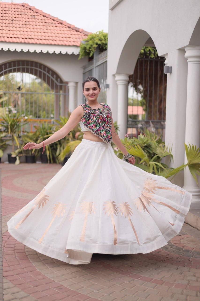Navratri Off-White Roman Silk Flared Lehenga Choli Set with Metallic Coconut Tree Gota Applique Work & Colorful Kutchi Mirror Work Crop Blouse