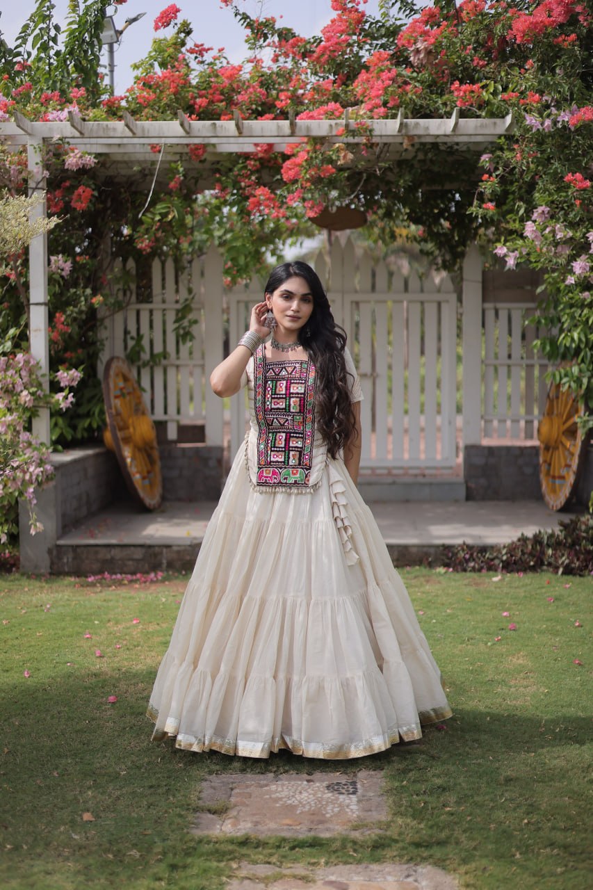 Off-White Kora Cotton Tiered Flared Lehenga Choli Set with Kutchi Embroidered Blouse