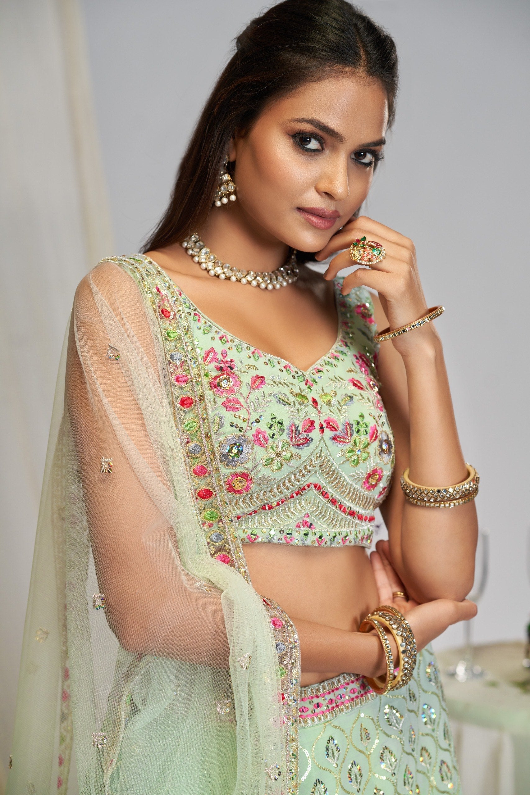 Mint Pastel Green Georgette Flared Lehenga Choli Set with Zari Leaf Jaal, Multi-Color Floral Resham Thread & Sequins Embroidery, Sleeveless Sweetheart Blouse & Matching Dupatta