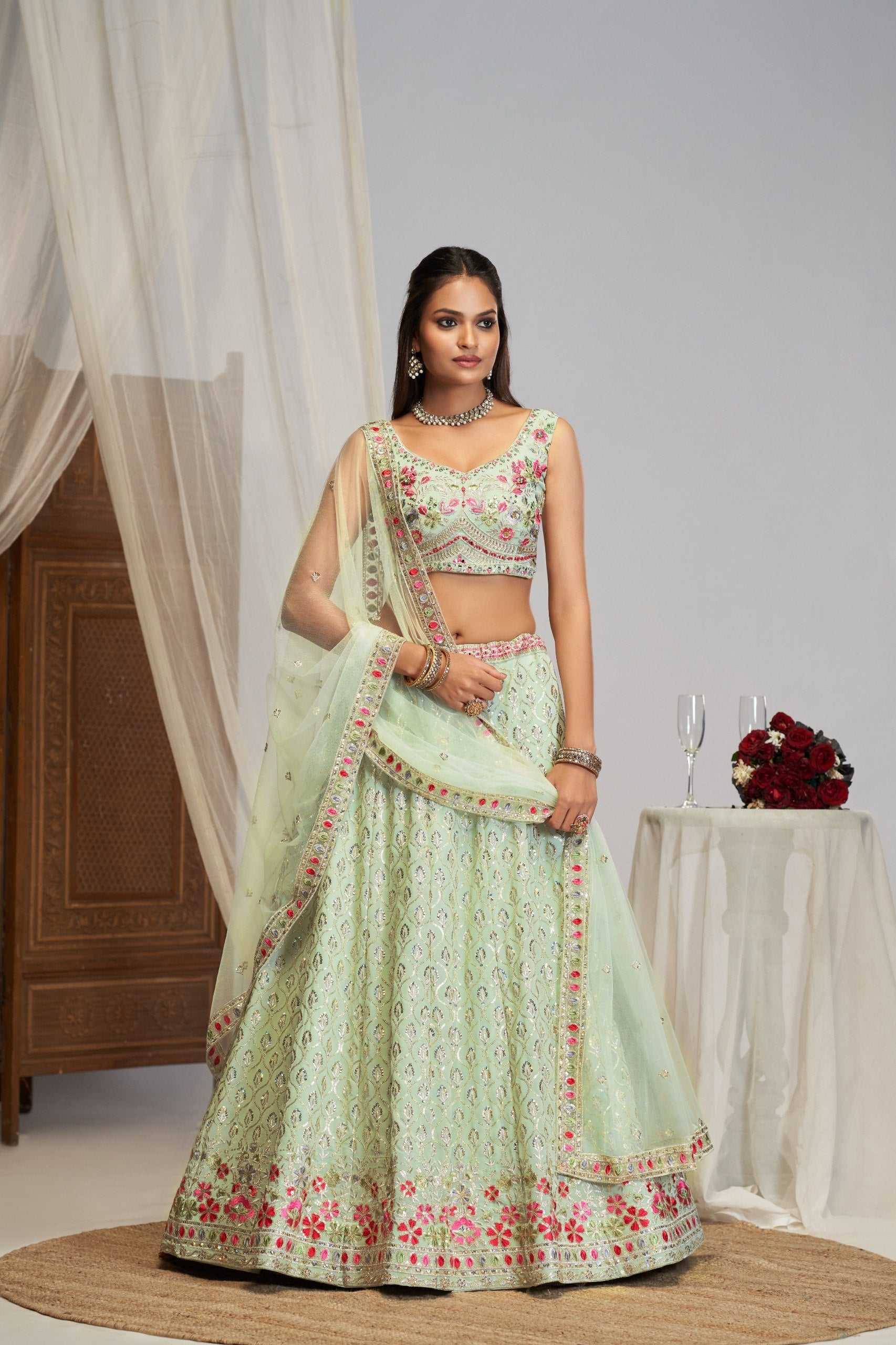 Mint Pastel Green Georgette Flared Lehenga Choli Set with Zari Leaf Jaal, Multi-Color Floral Resham Thread & Sequins Embroidery, Sleeveless Sweetheart Blouse & Matching Dupatta