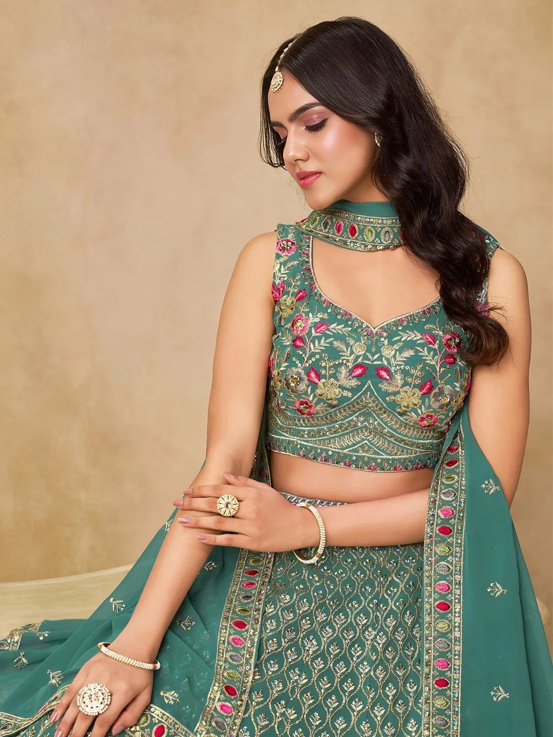Teal Sea Green Georgette Flared Lehenga Choli Set with Rich Zari Leaf Jaal, Multi-Color Floral Thread & Sequins Embroidery, Sleeveless Sweetheart Blouse & Matching Dupatta