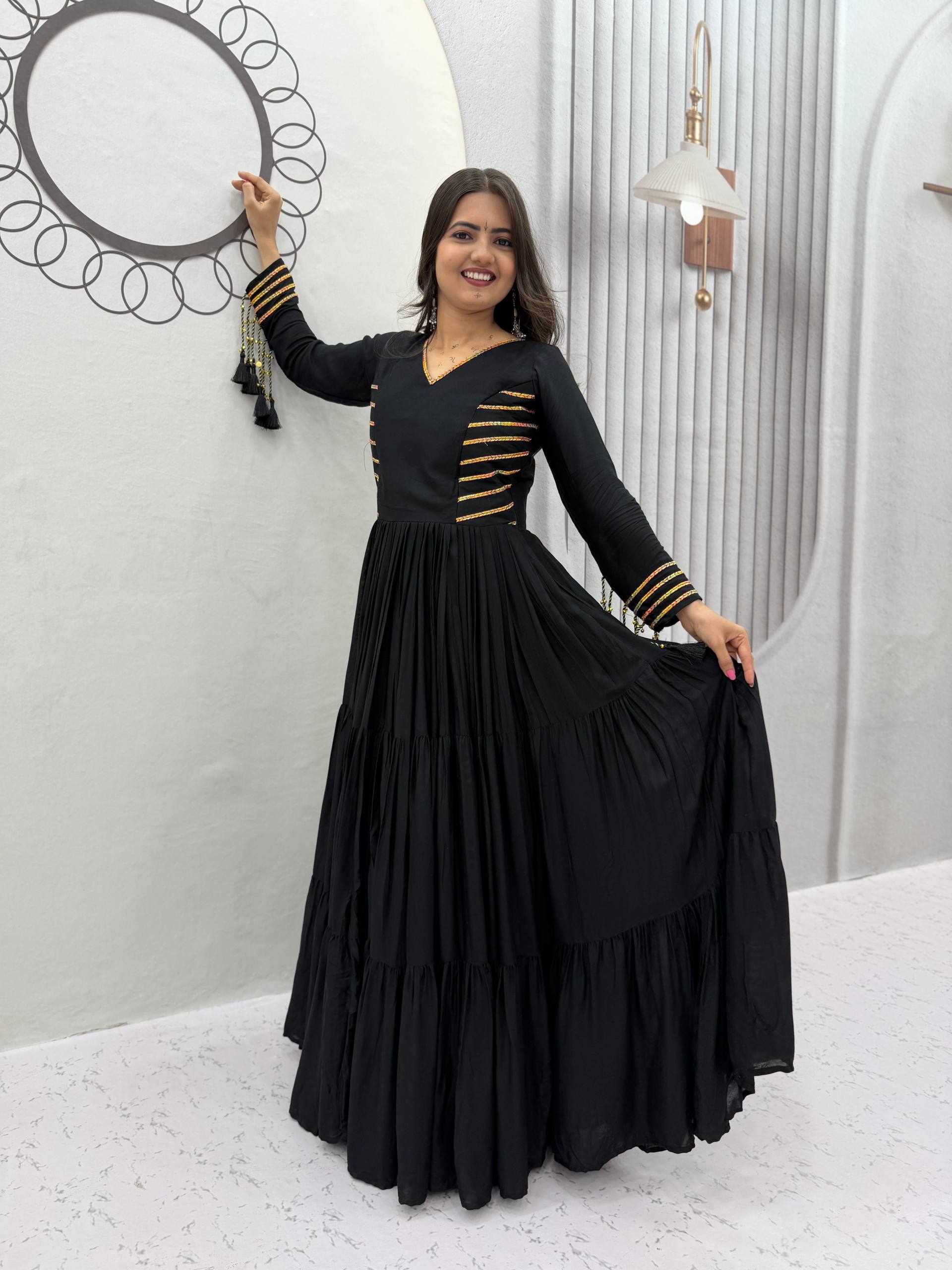 Jet Black Pure Cotton Navratri Special Tiered Anarkali Gown with Gota Work and Hanging Tassels by The Beauty Queen