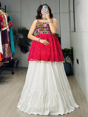 Rani pink Bandhani printed Kutchi mirror embroidered peplum top with white pure rayon cotton plain frill pattern Navratri lehenga and micro cotton inner