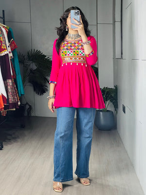 Rani pink pure rayon cotton Gamthi Kutchi embroidered short peplum kurti with real mirror work and cowrie shell lace border