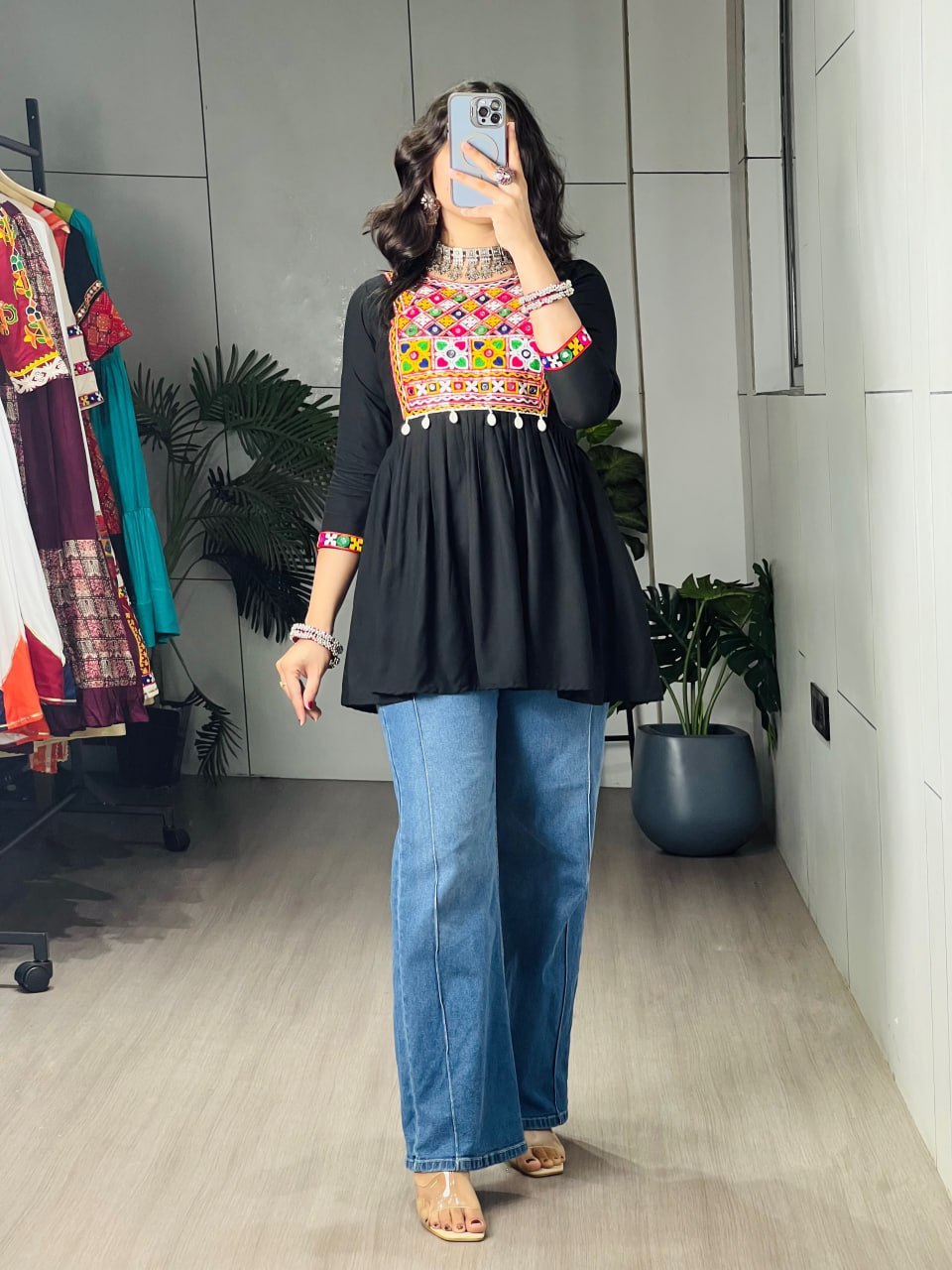 Black pure rayon cotton Gamthi Kutchi embroidered short peplum kurti with real mirror work and cowrie shell lace border