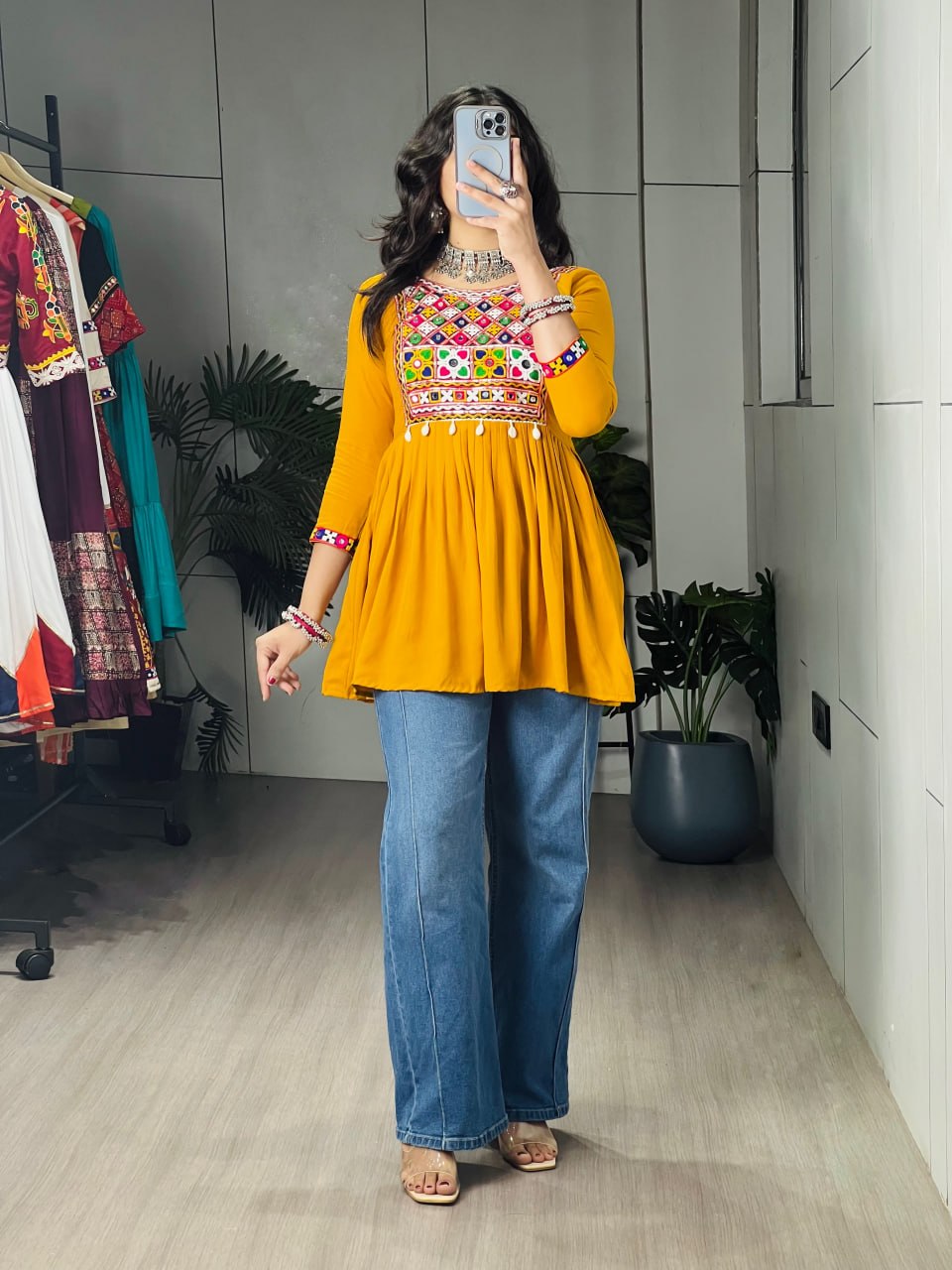 Yellow pure rayon cotton Gamthi Kutchi embroidered short peplum kurti with real mirror work and cowrie shell lace border