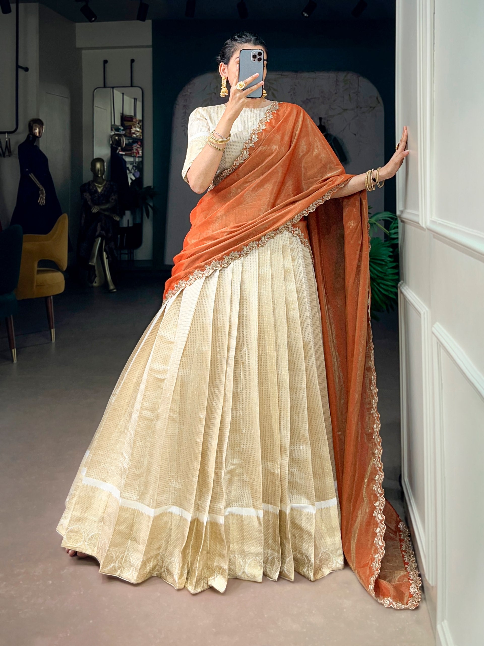 Off-White & Cream Jacquard Checks Silk Half Saree Lehenga Set with Rich Gold Zari Weaving Border, Puff Sleeve Blouse & Rust Orange Scalloped Embroidered Dupatta