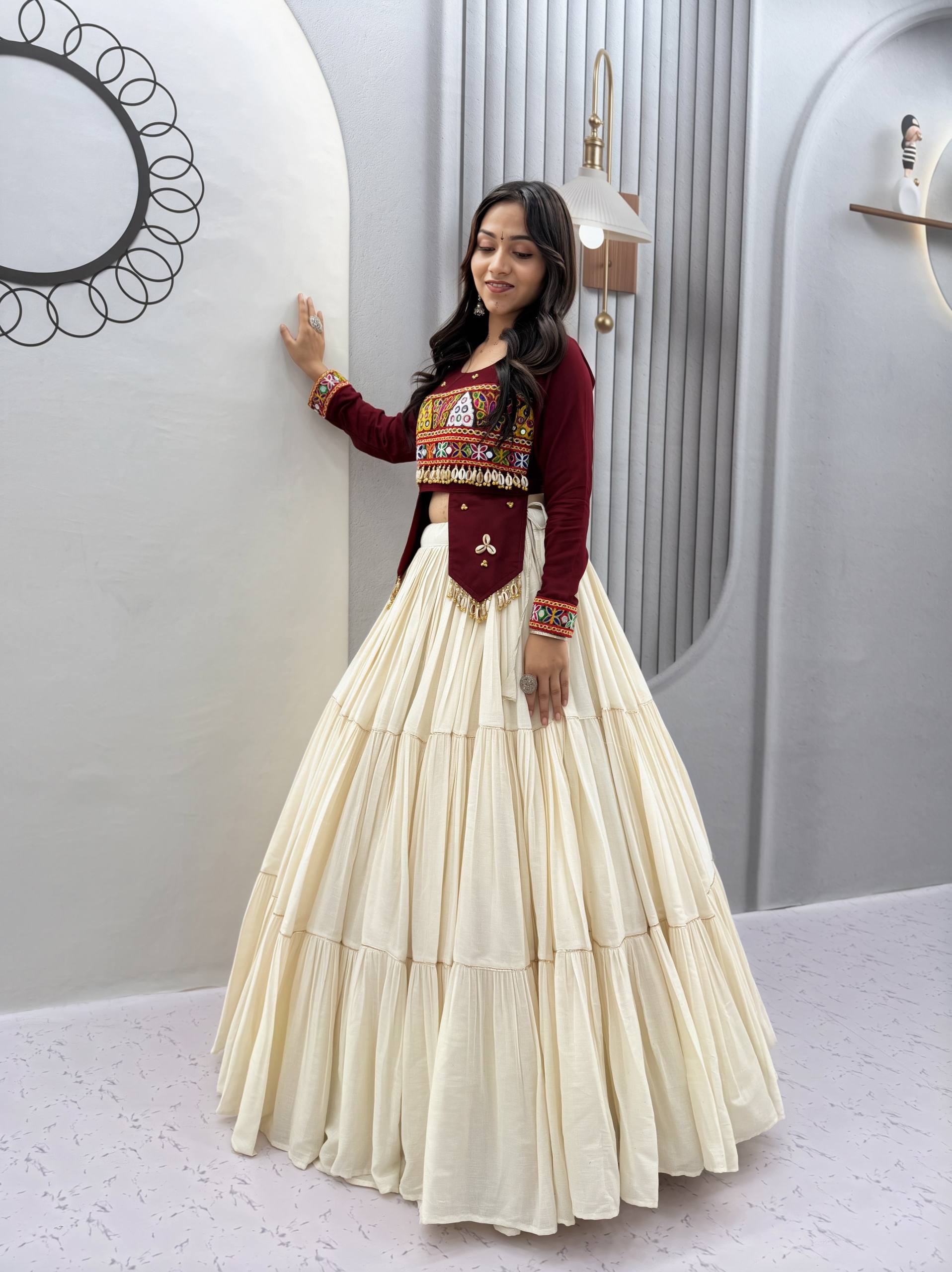Navratri Off-White Multi-Tiered Flared Lehenga with Maroon Wine Kediya Jacket Blouse, Real Kodi & Kutchi Gamthi Hand Work