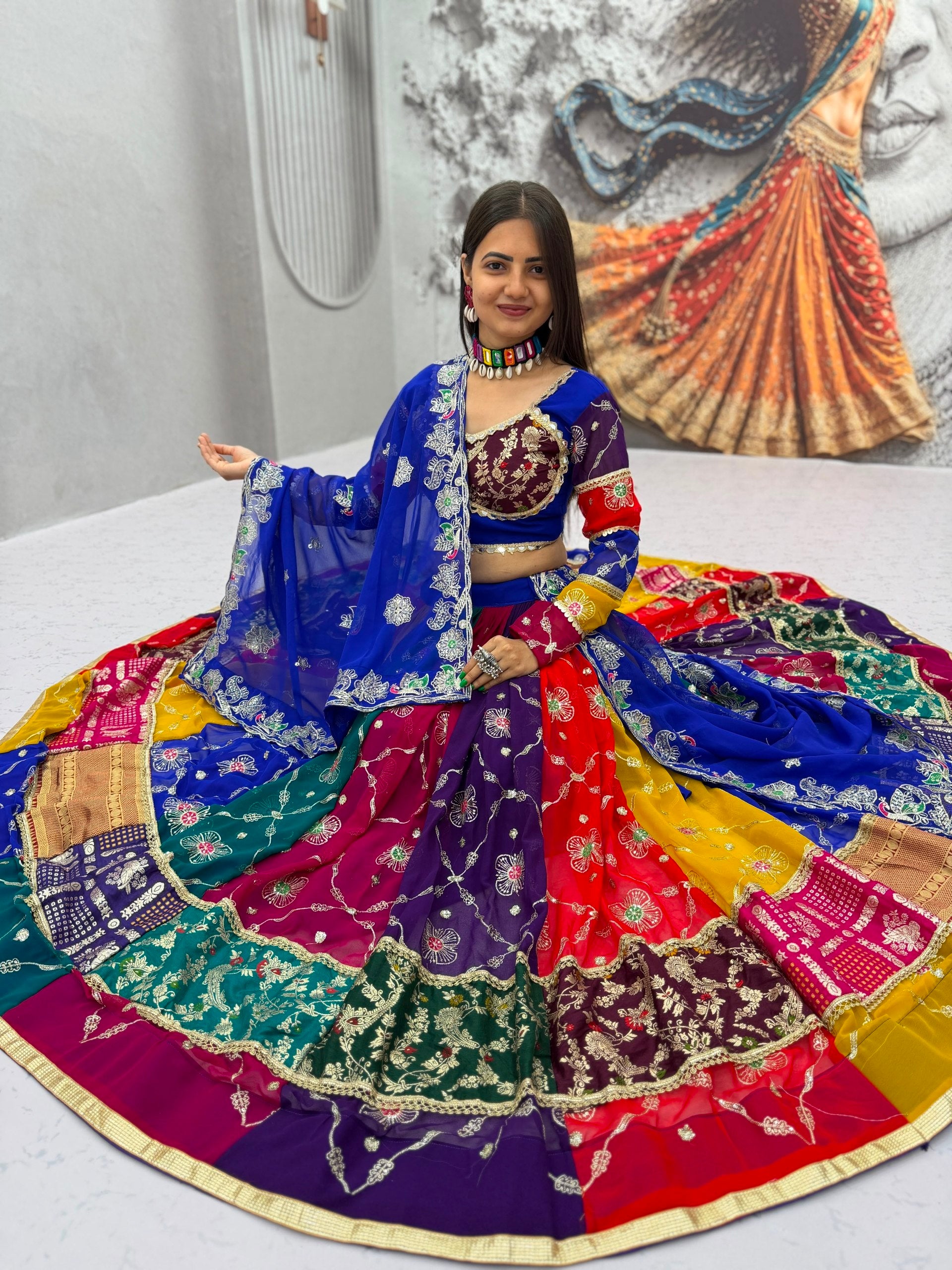 Multi-Color Vintage Fox Georgette Flared Navratri Lehenga Choli Set with Rich Jacquard Borders, Multi-Color Panel Sleeves & Royal Blue Zari Embroidered Dupatta