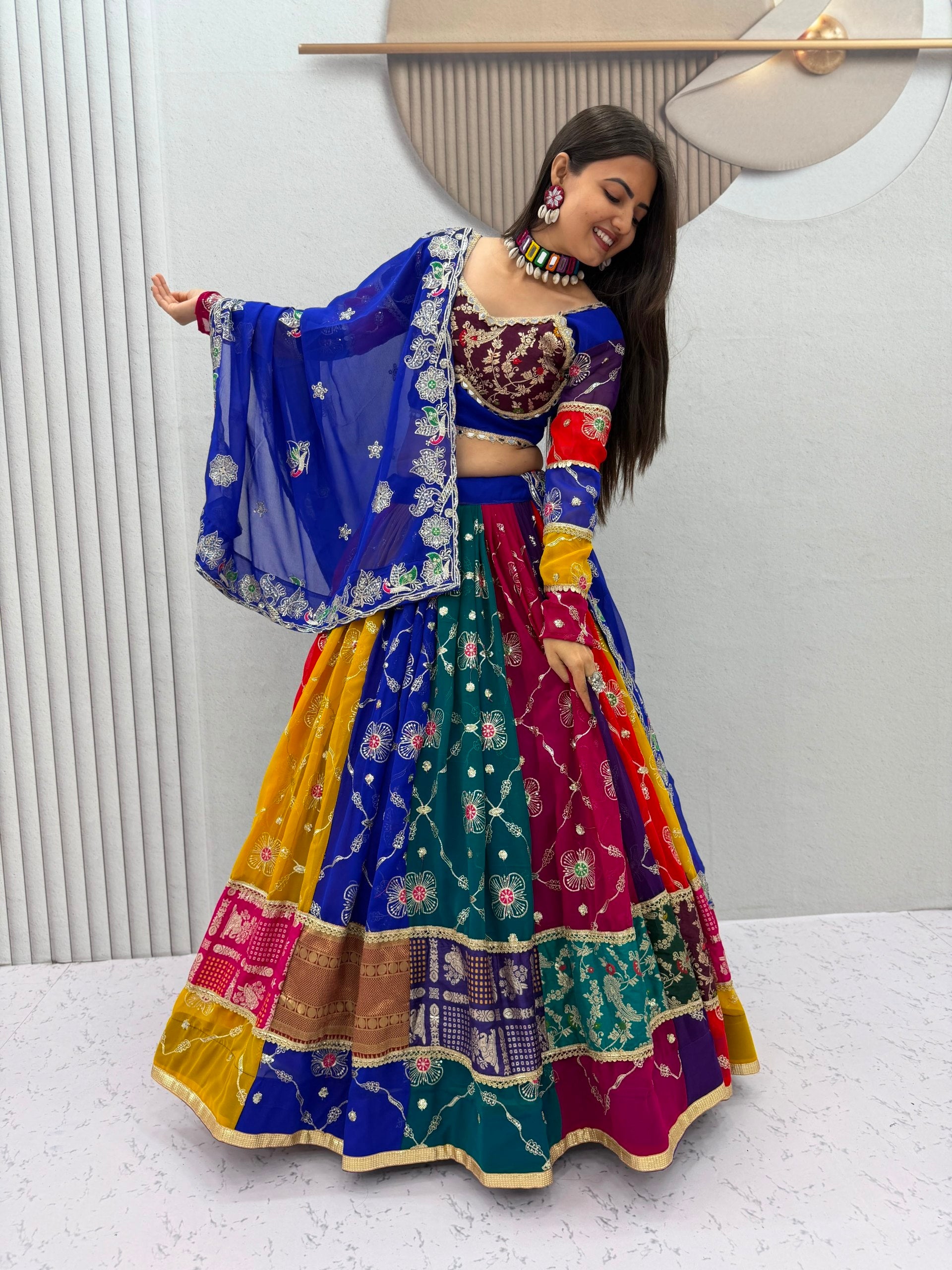 Multi-Color Vintage Fox Georgette Flared Navratri Lehenga Choli Set with Rich Jacquard Borders, Multi-Color Panel Sleeves & Royal Blue Zari Embroidered Dupatta