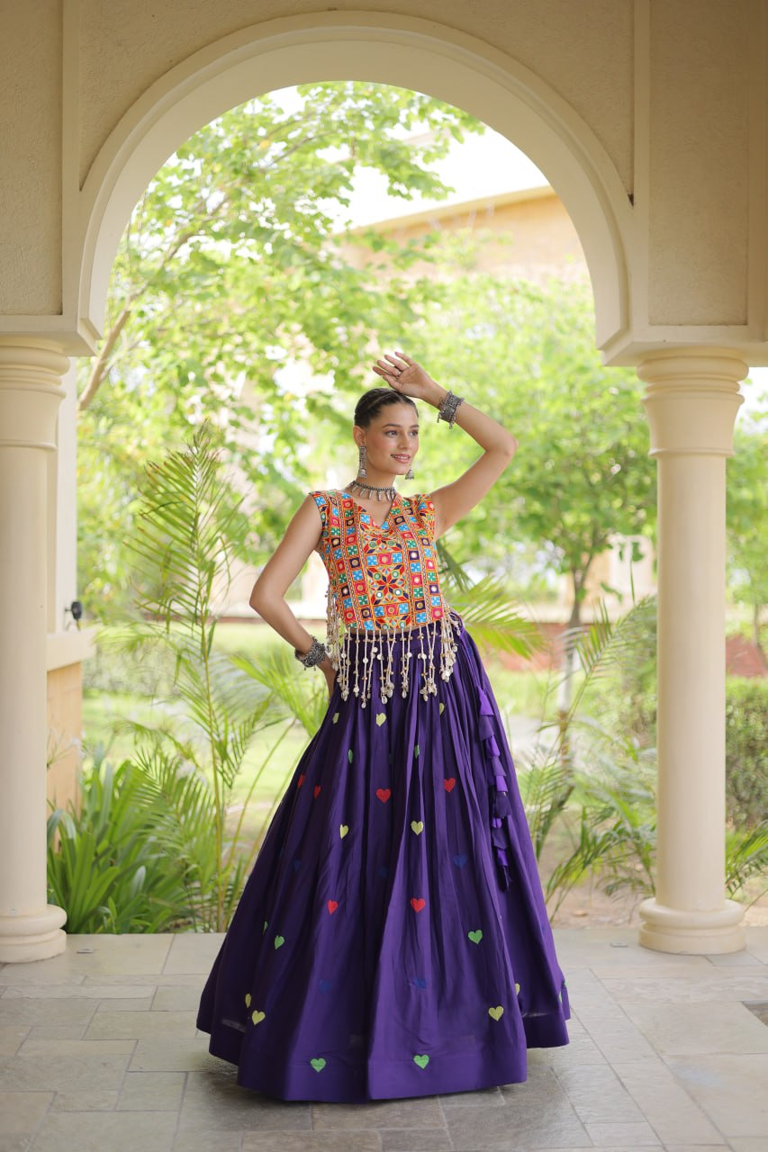 Model Posing In Purple Cora Cotton Heart Thread Embroidery Navratri Lehenga Choli Set By The Beauty Queen