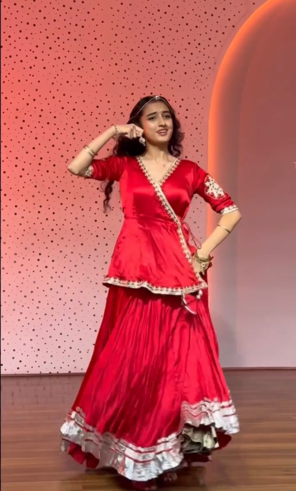 Model Wearing Red Crepe Silk Angrakha Kurti With Micro Cotton Flared Lehenga Set By The Beauty Queen