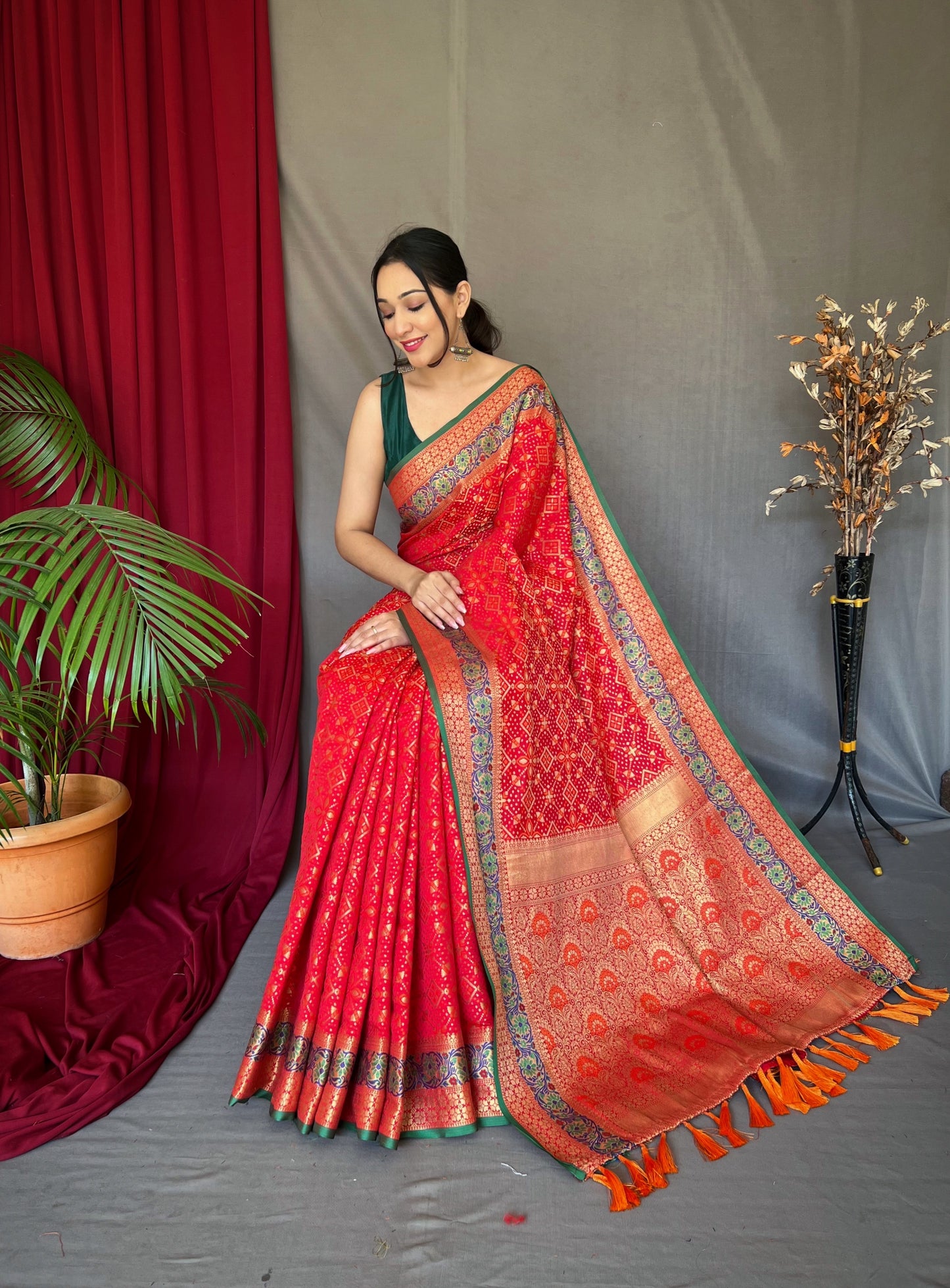 Red Color Ethnic Motifs Zari Silk Blend Patola Saree