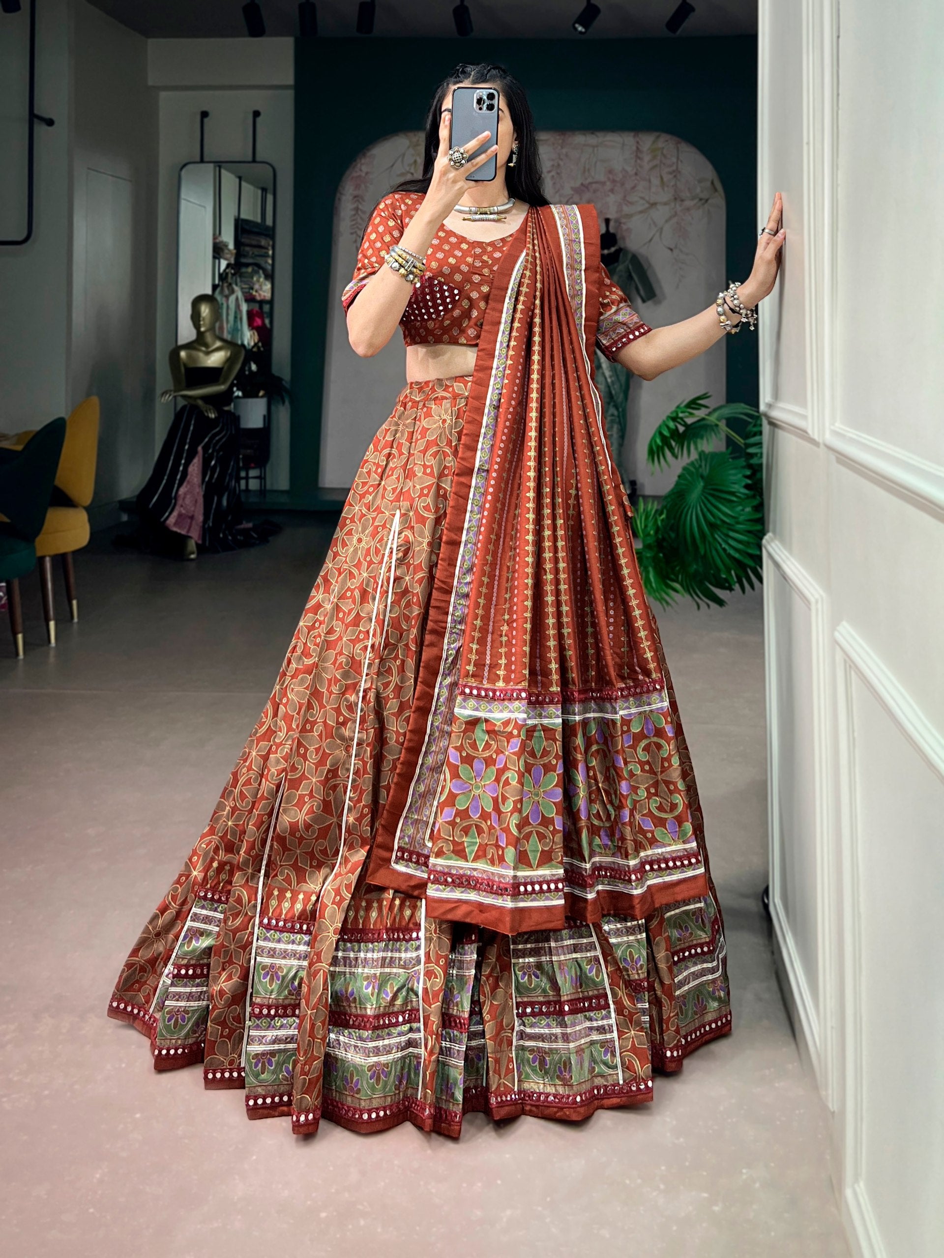 Model wearing Rust Orange Tasar Silk With Iconic Sparkle With Lace Border Navratri Lehenga Choli Set by The Beauty Queen