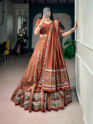 Model wearing Rust Orange Tasar Silk With Iconic Sparkle With Lace Border Navratri Lehenga Choli Set by The Beauty Queen
