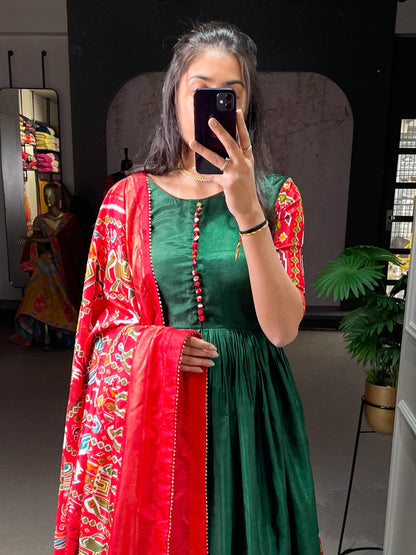 Green Color Patola And Foil Printed Dola Silk Gown